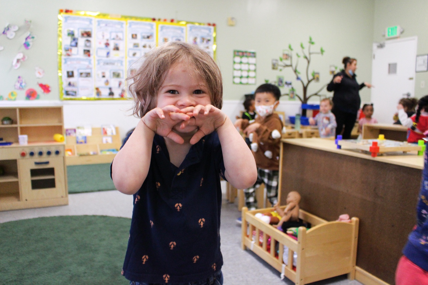 Little boy having fun at preschool